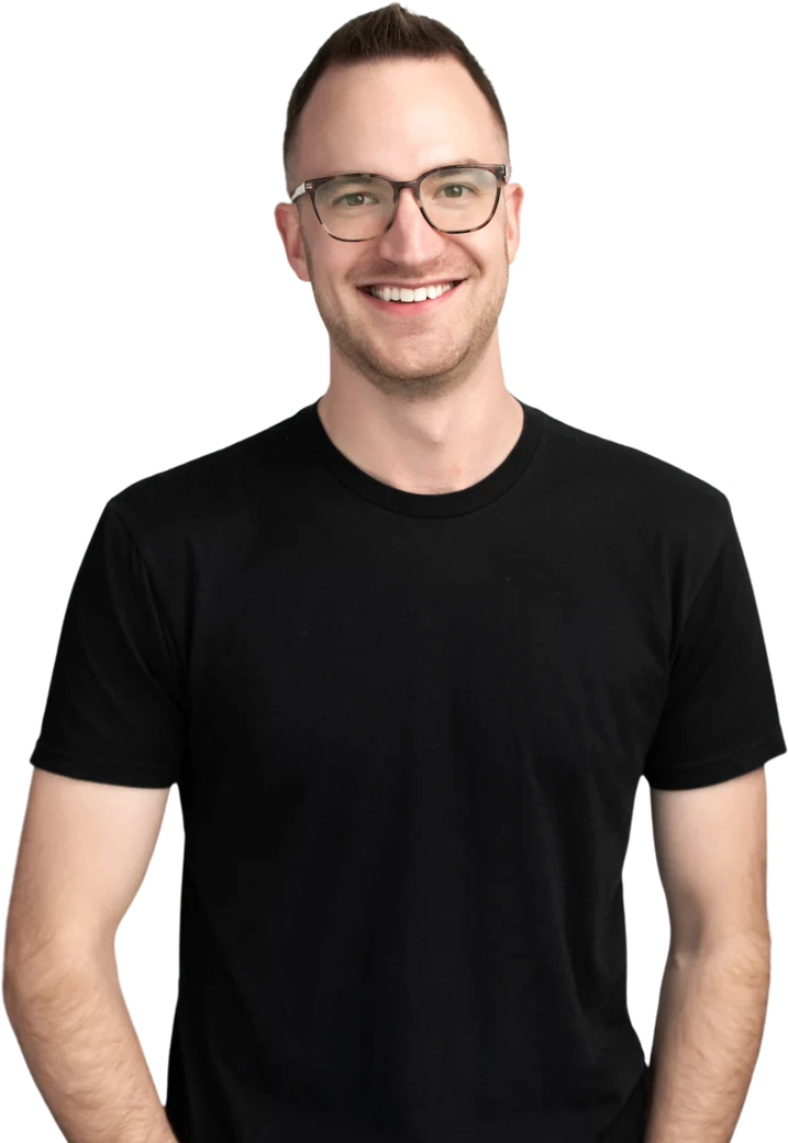 James Green, founder of Dominion AI, standing in a dark T-shirt